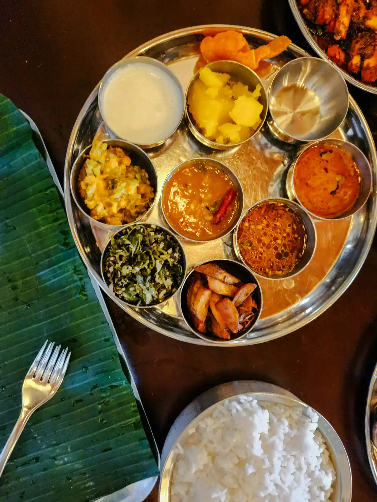 Indian vegetarian thali with rice, dal and side dishes