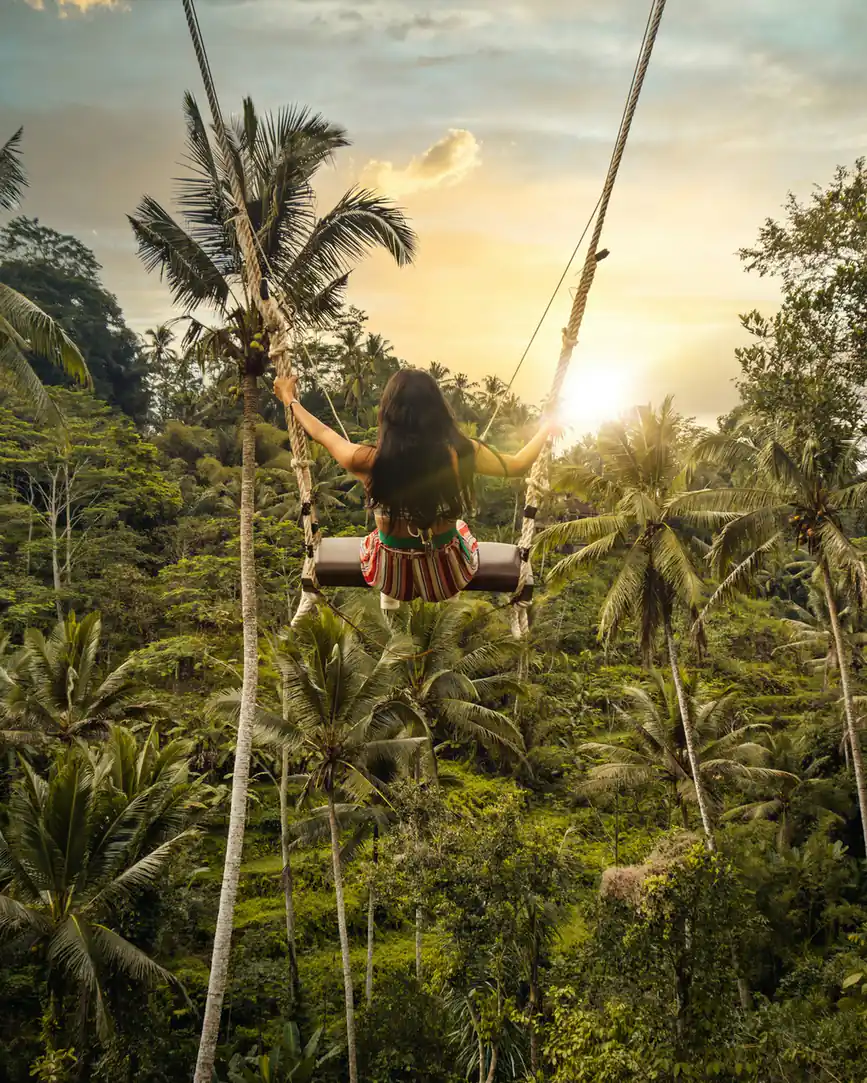 Swing over the jungle at sunrise in Bali