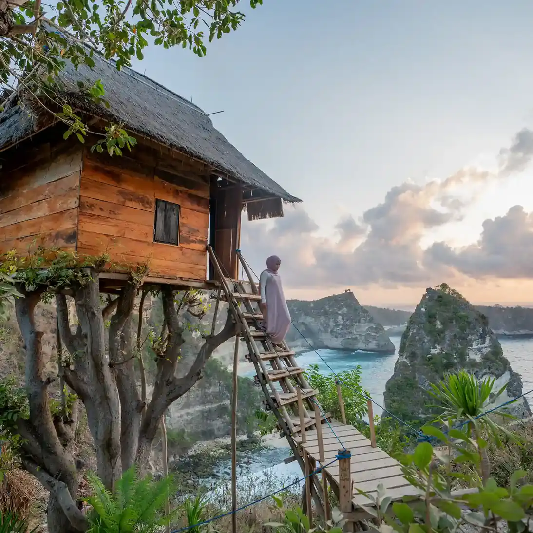 Tree house on a Nusa Penida clifftop overlooking small islets